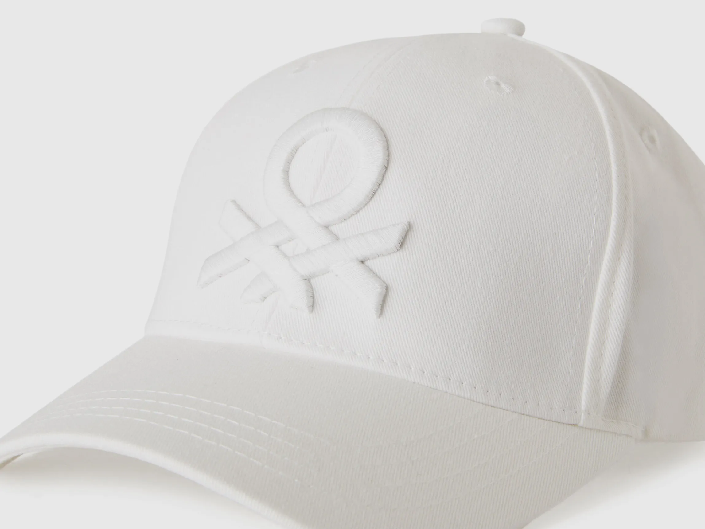 Baseball hat with embroidered logo