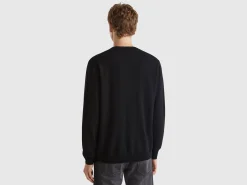 Black crew neck sweater in pure Merino wool