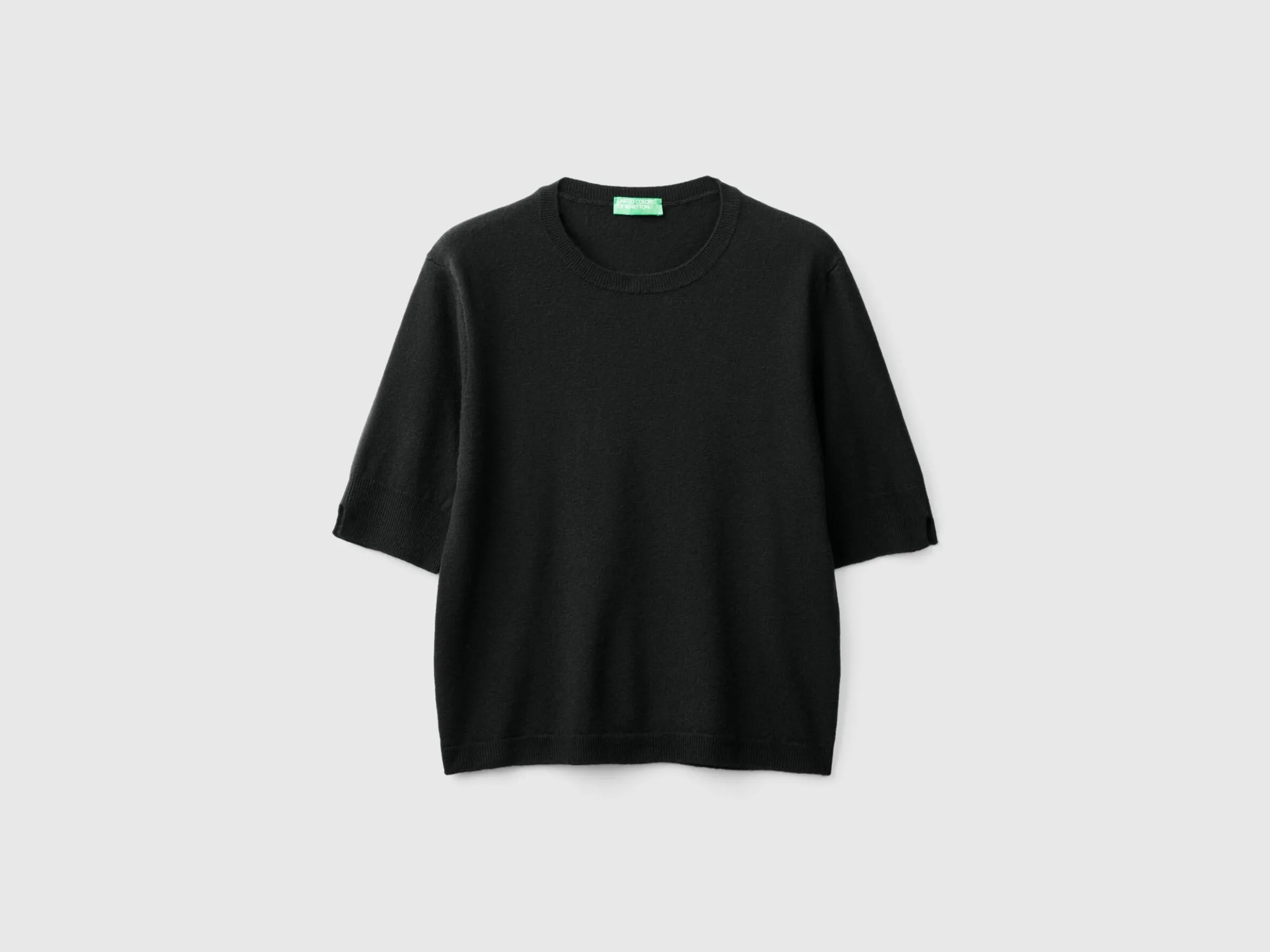 Black short sleeve sweater in pure Merino wool