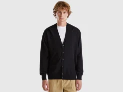 Black V-neck cardigan in pure Merino wool