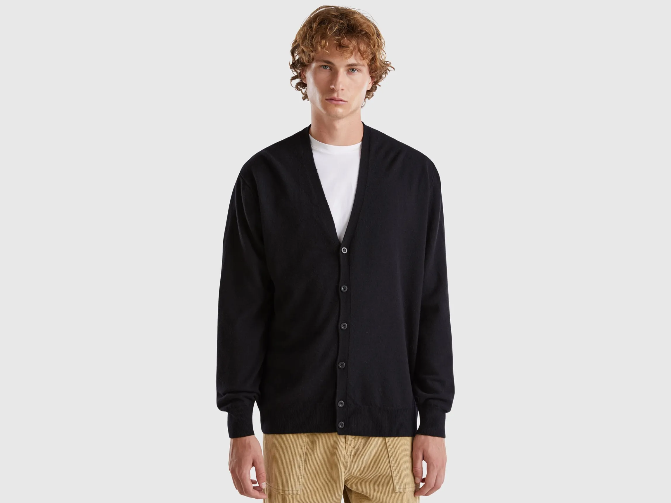 Black V-neck cardigan in pure Merino wool