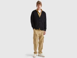 Black V-neck cardigan in pure Merino wool