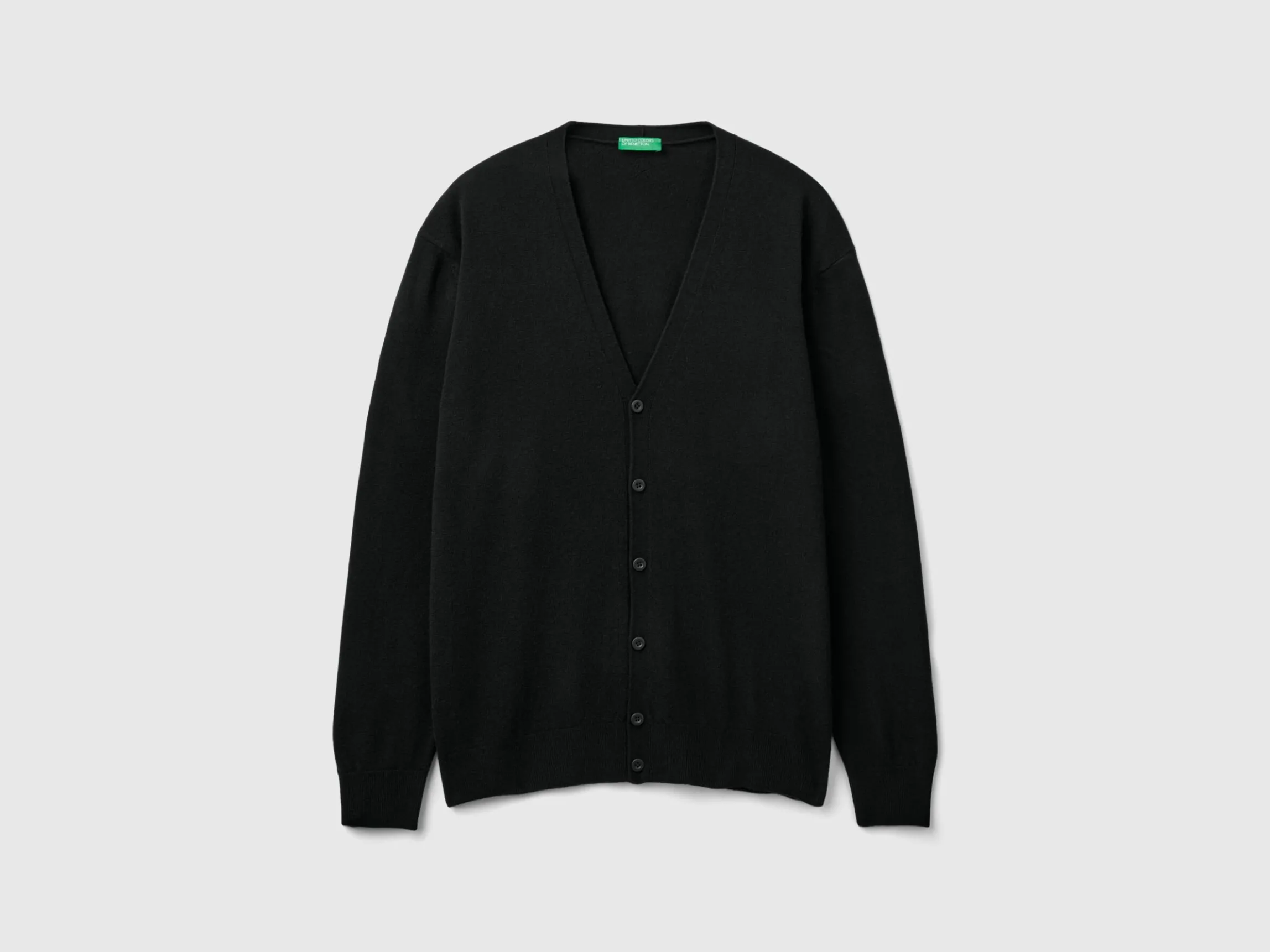 Black V-neck cardigan in pure Merino wool