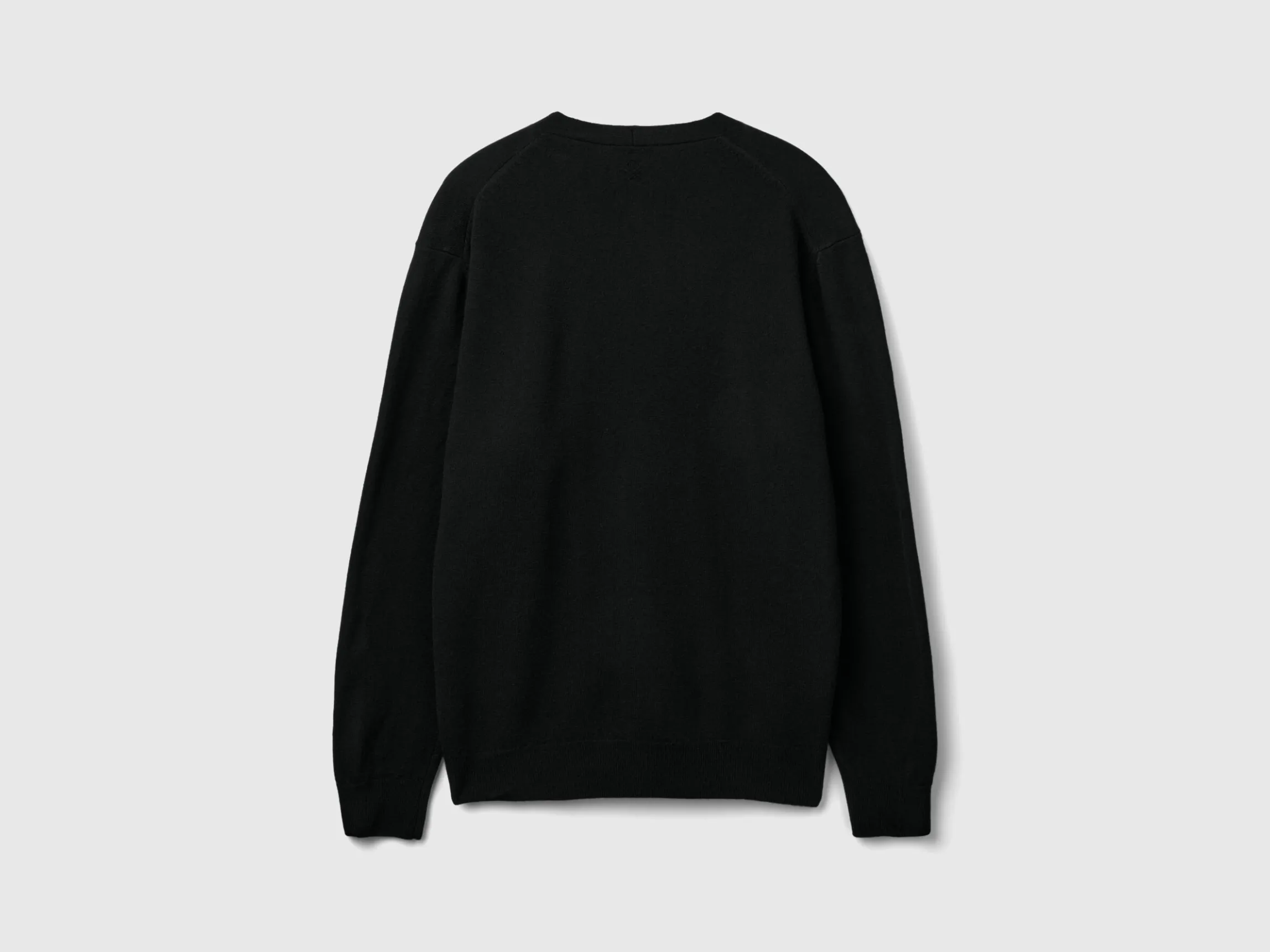 Black V-neck cardigan in pure Merino wool