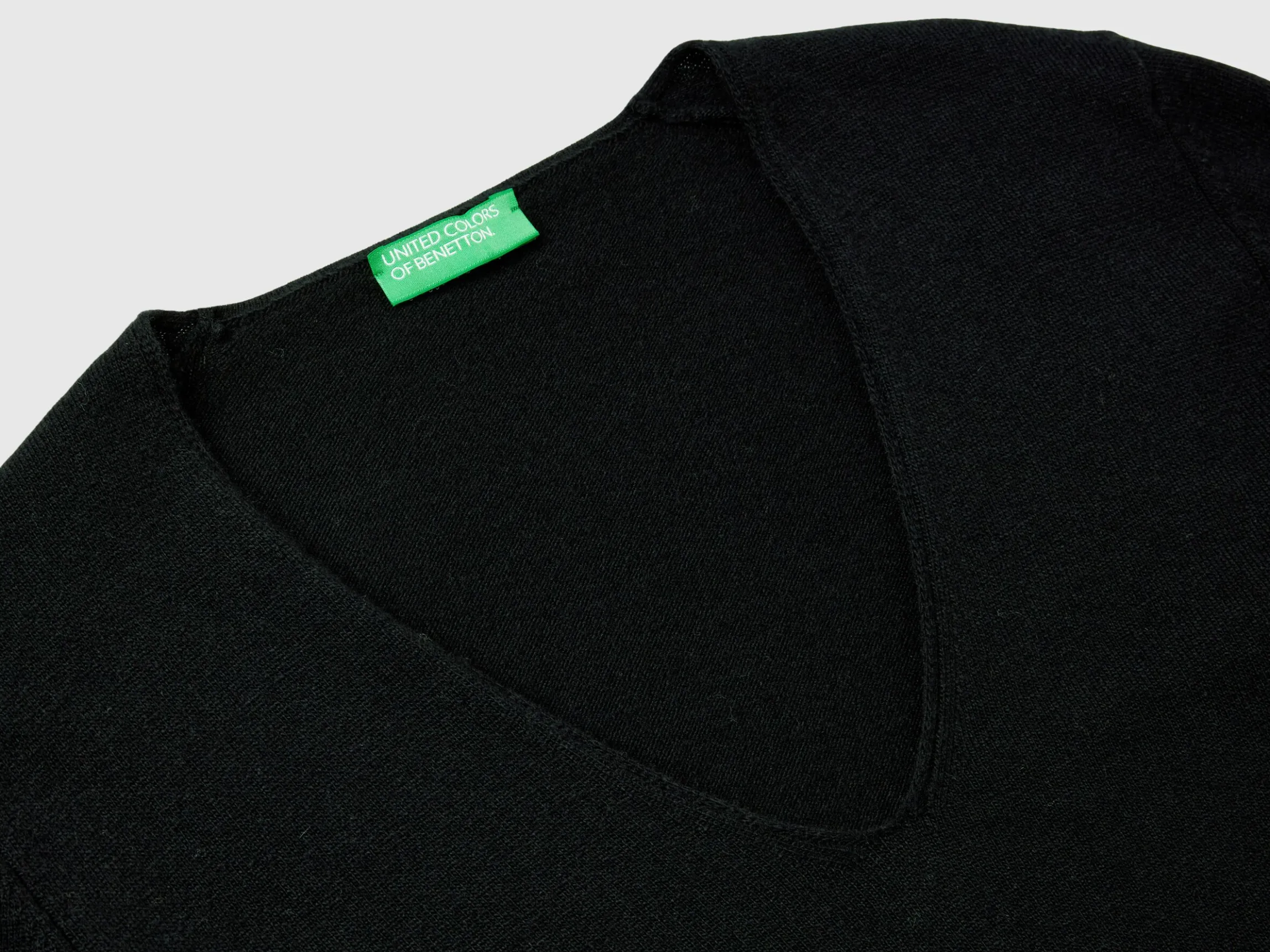 Black V-neck sweater in pure Merino wool