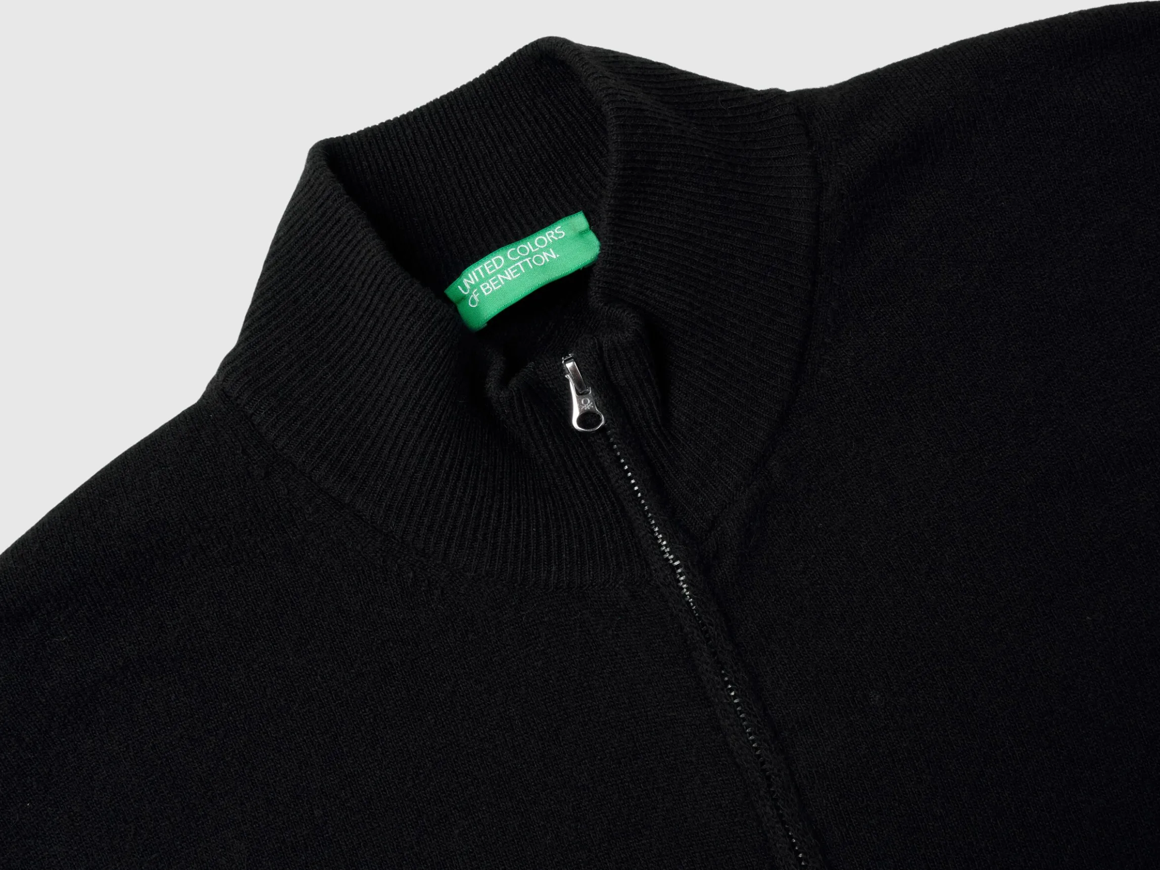 Black zip-up cardigan in pure Merino wool