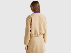 Bomber jacket with bouclé look