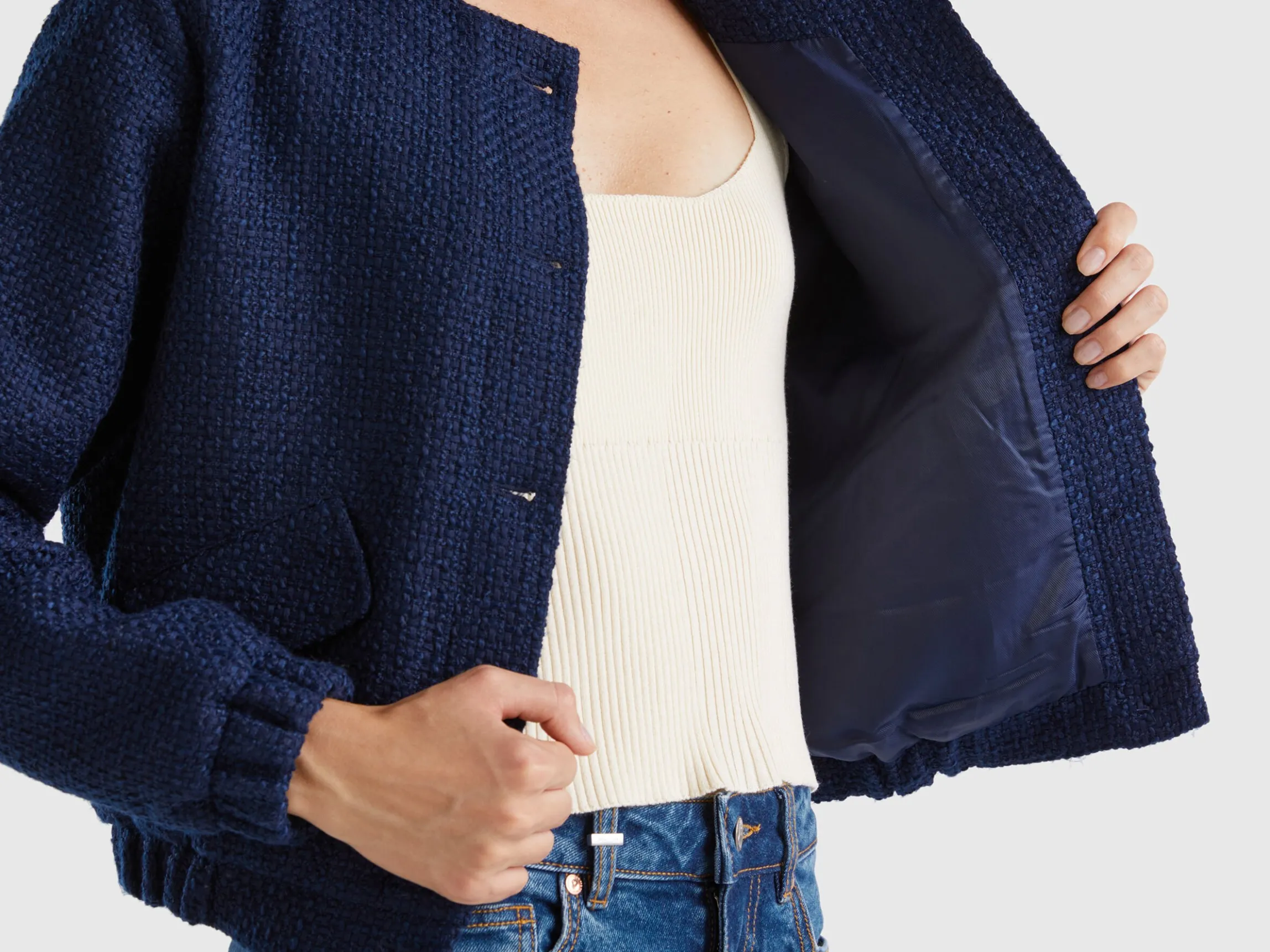 Bomber jacket with bouclé look
