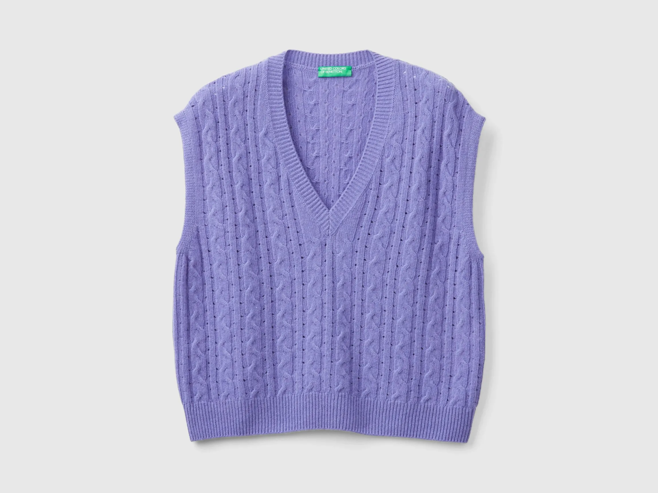 Boxy fit vest with cable knit and perforations