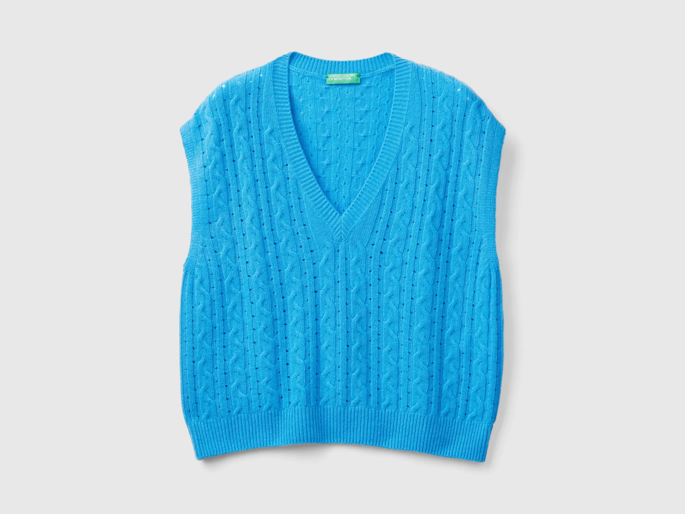 Boxy fit vest with cable knit and perforations