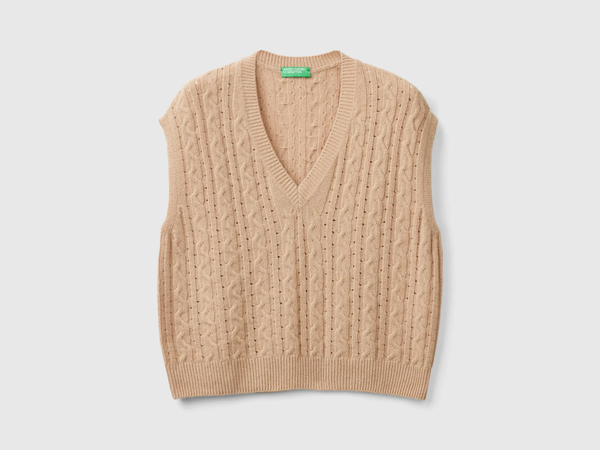 Boxy fit vest with cable knit and perforations