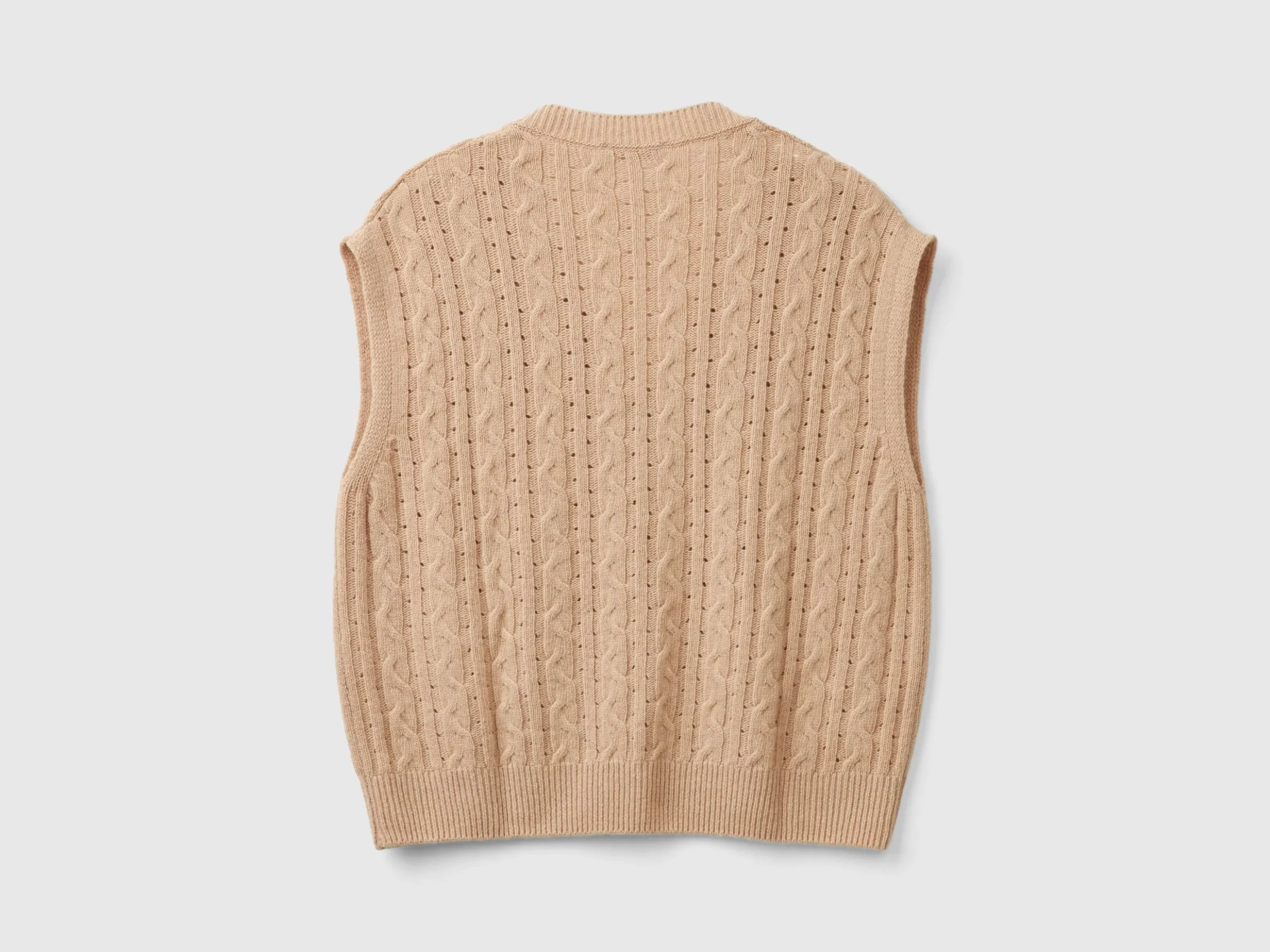Boxy fit vest with cable knit and perforations