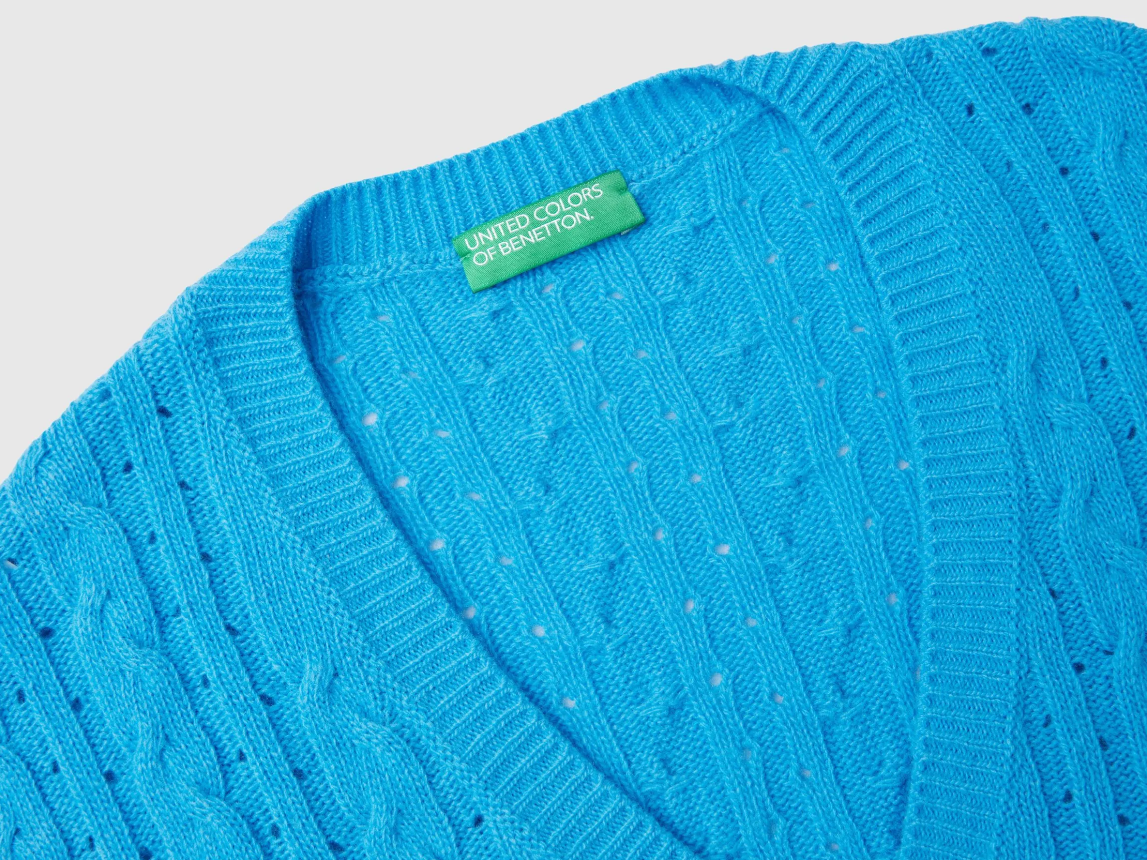 Boxy fit vest with cable knit and perforations