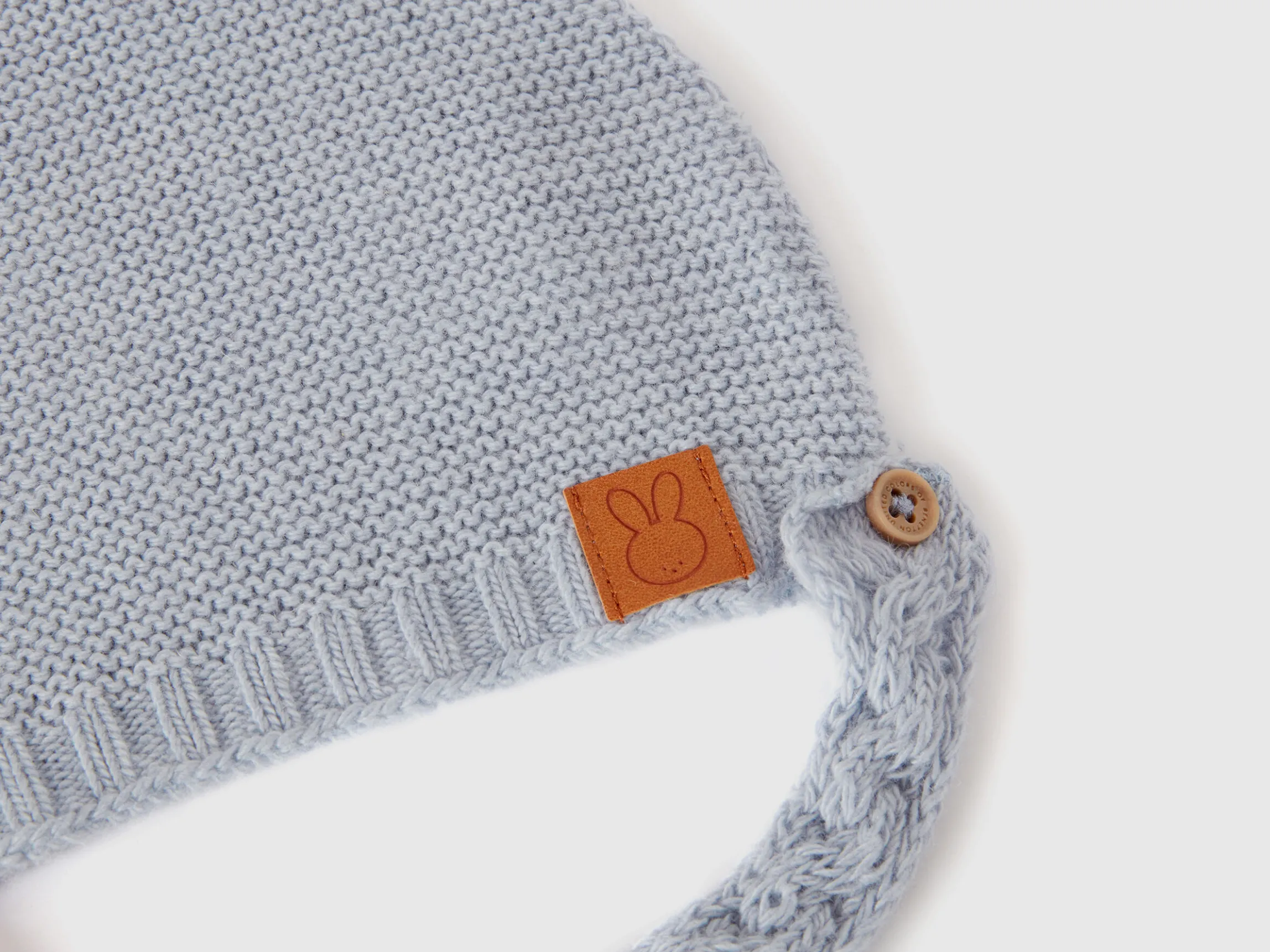 Cap with ear applique in recycled wool blend
