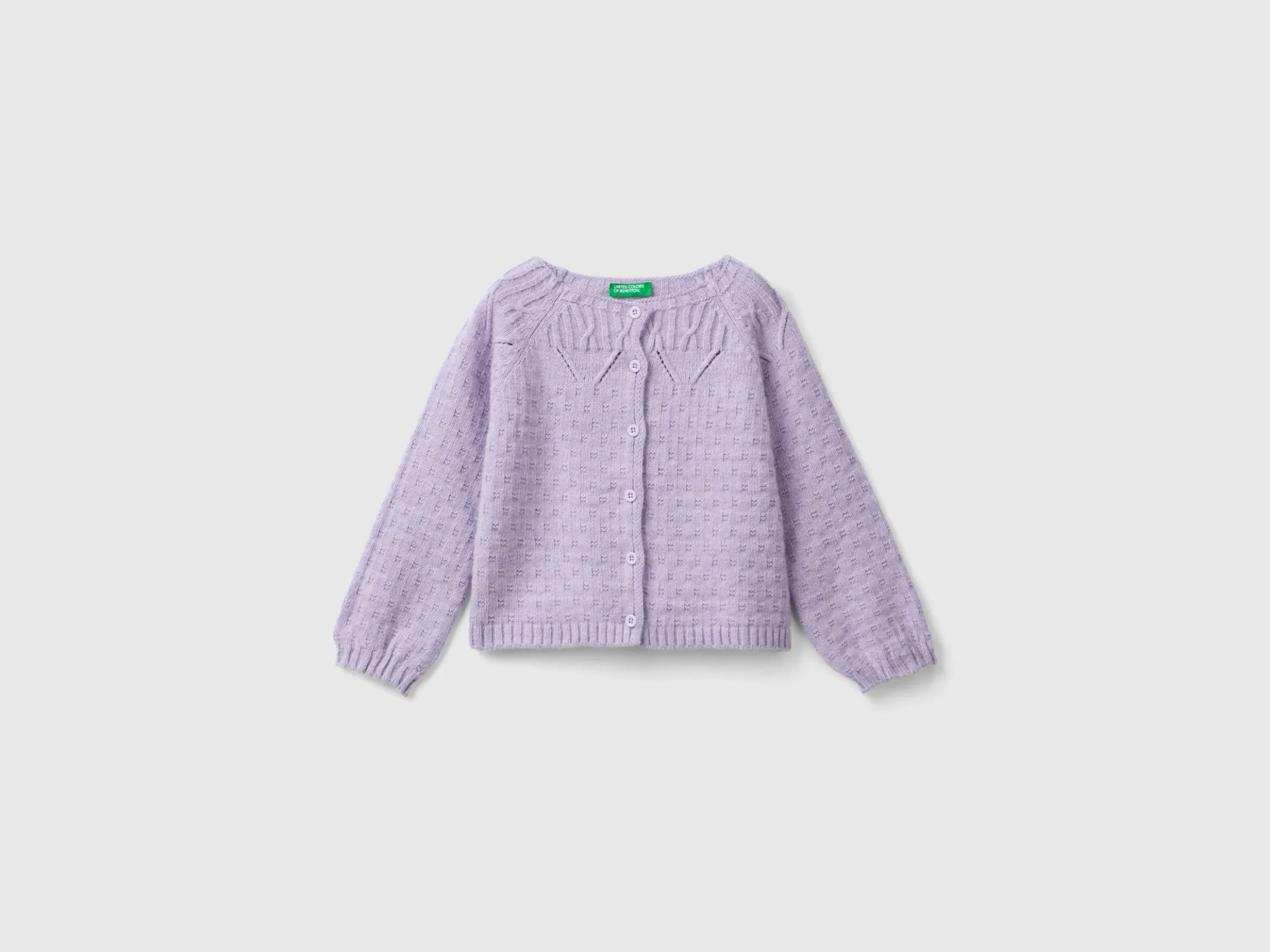 Cardigan with perforated details