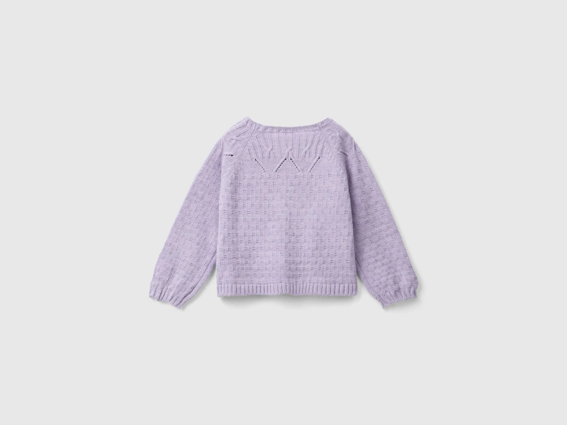 Cardigan with perforated details