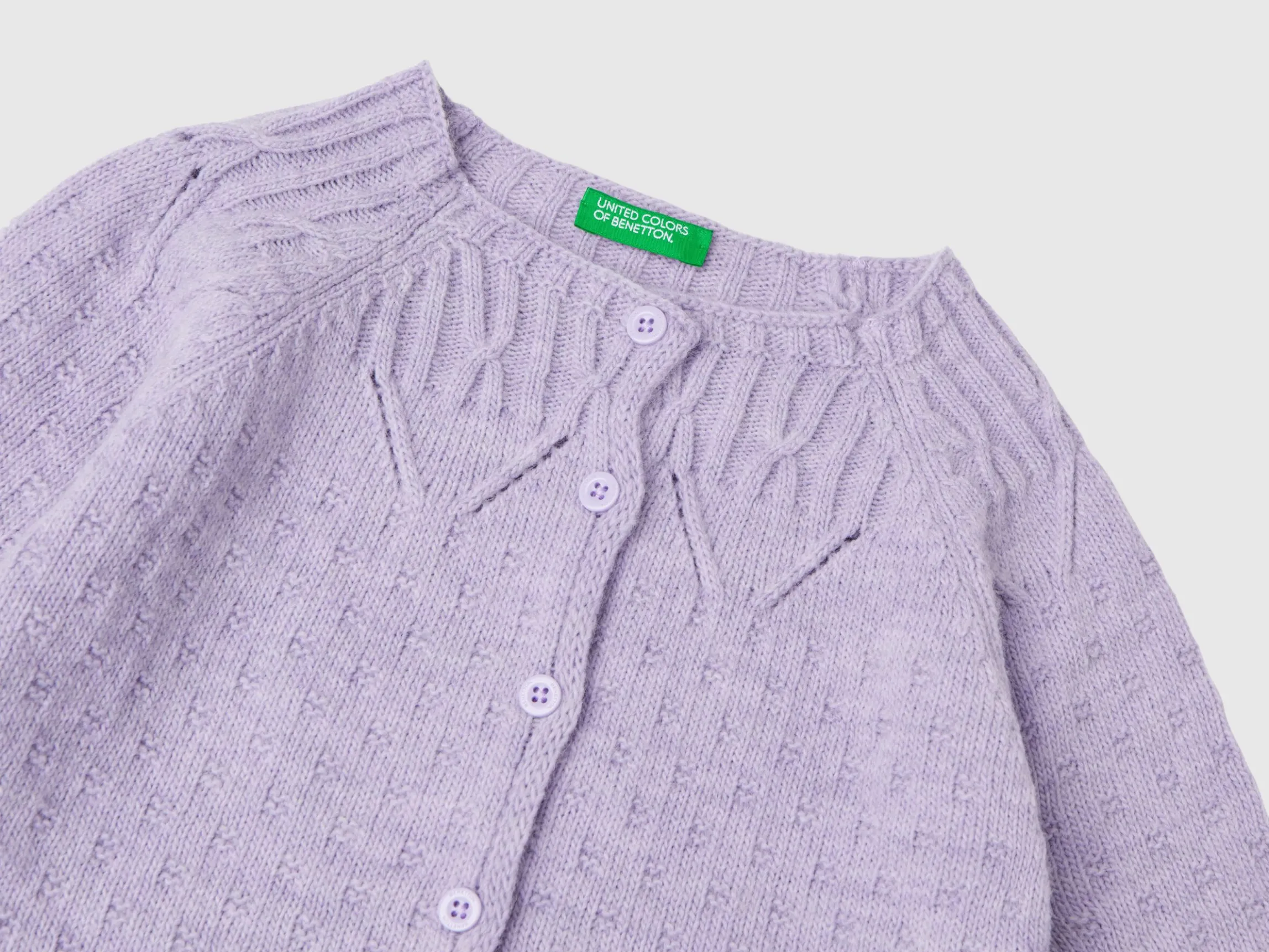 Cardigan with perforated details