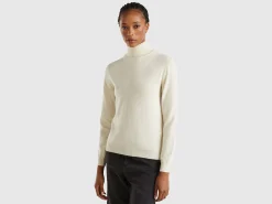 Cream turtleneck sweater in pure Merino wool
