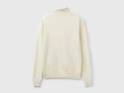 Cream turtleneck sweater in pure Merino wool