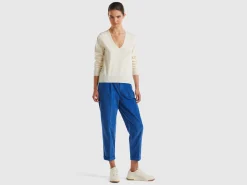 Cream V-neck sweater in pure Merino wool