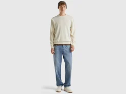 Creamy white crew neck sweater in pure Merino wool