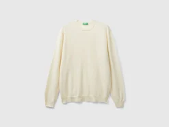 Creamy white crew neck sweater in pure Merino wool