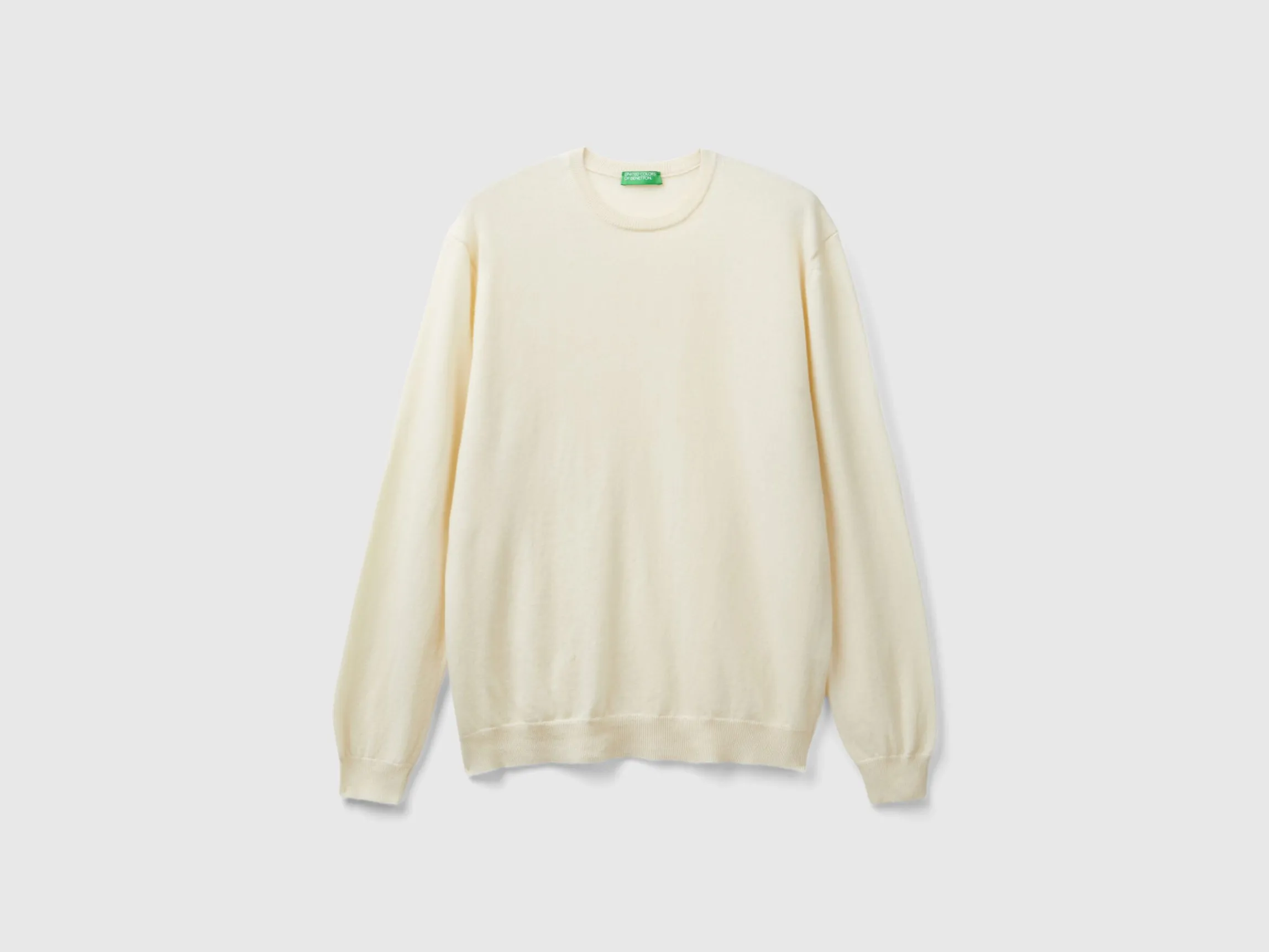 Creamy white crew neck sweater in pure Merino wool