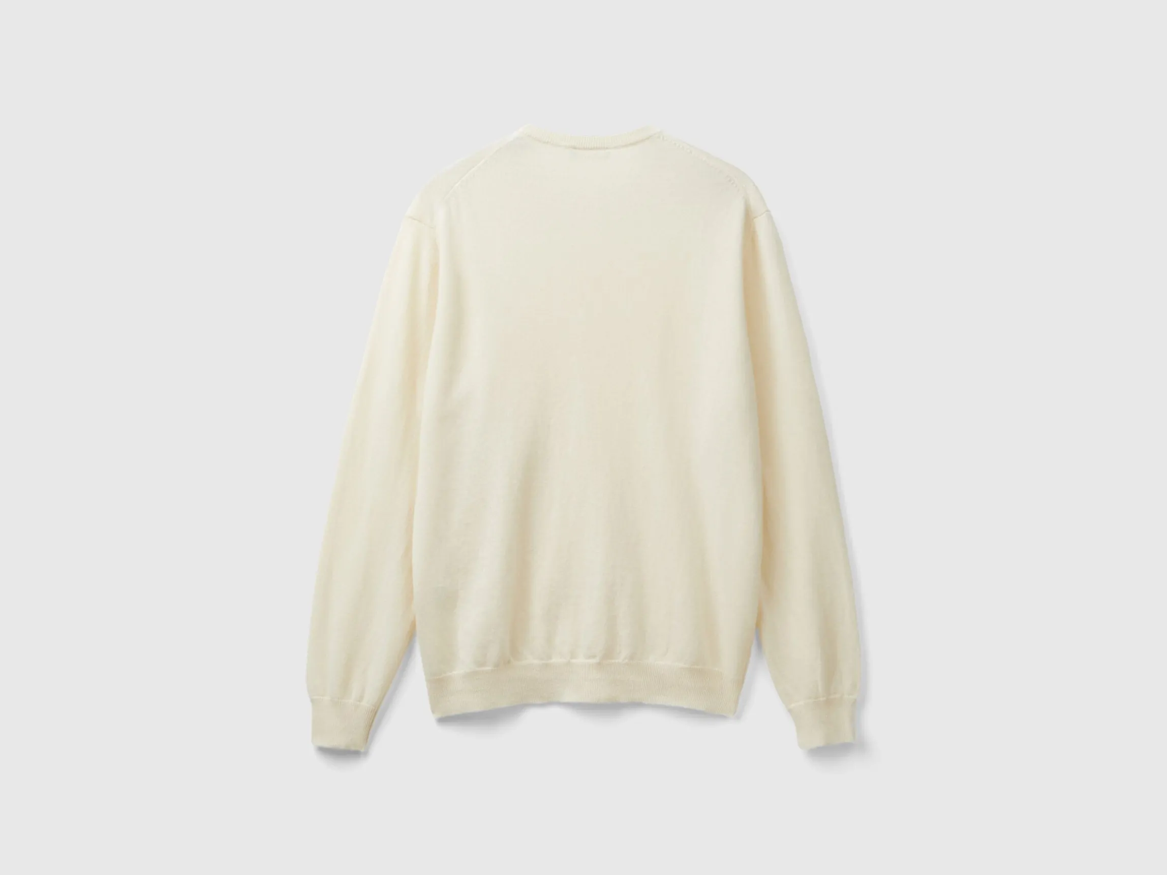 Creamy white crew neck sweater in pure Merino wool