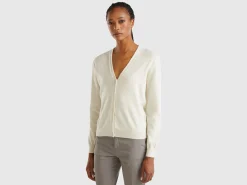 Creamy white V- neck cardigan in pure Merino wool