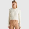Cropped sweater with cable knit and perforations
