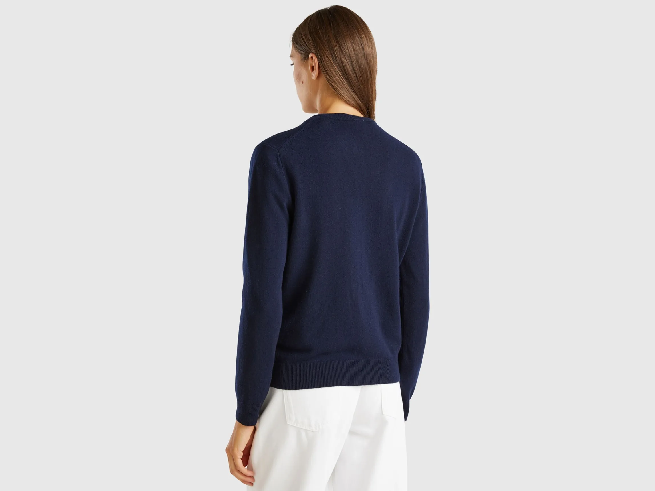 Dark blue crew neck cardigan in pure Merino wool