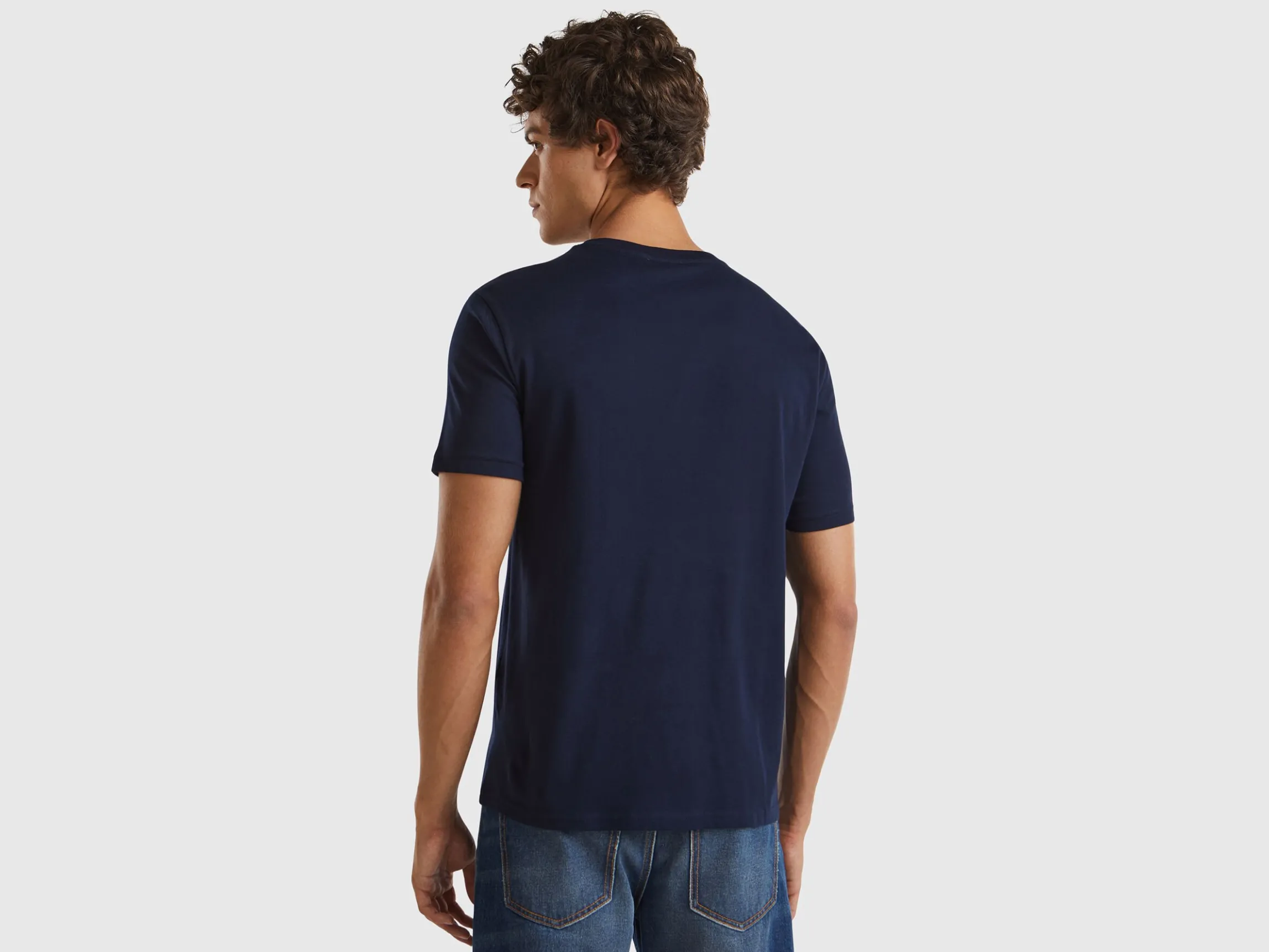 Dark blue organic cotton t-shirt with green logo