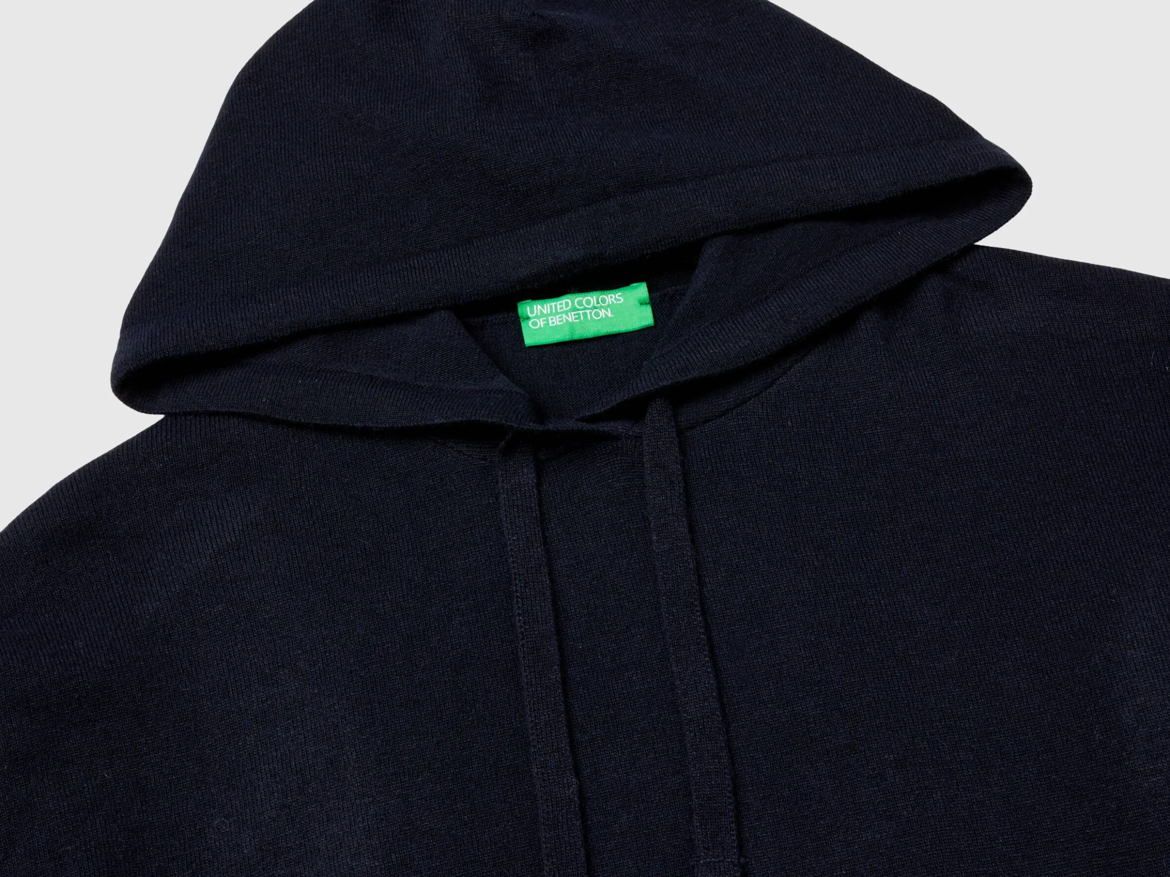 Dark blue sweater in cashmere blend with hood