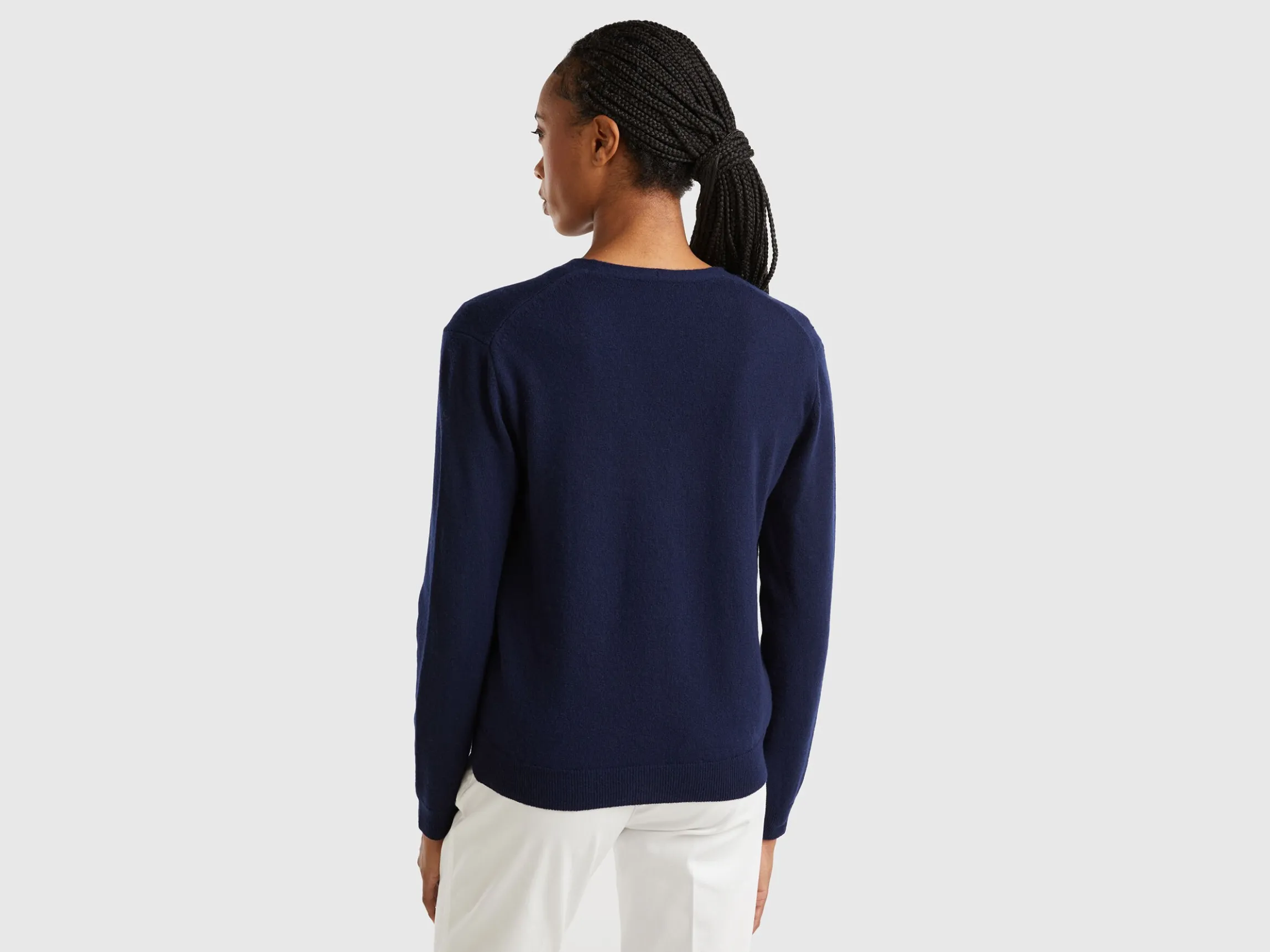 Dark blue V-neck cardigan in pure Merino wool