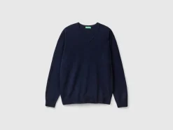 Dark blue V-neck sweater in pure Merino wool