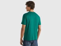 Dark green organic cotton t-shirt with orange logo