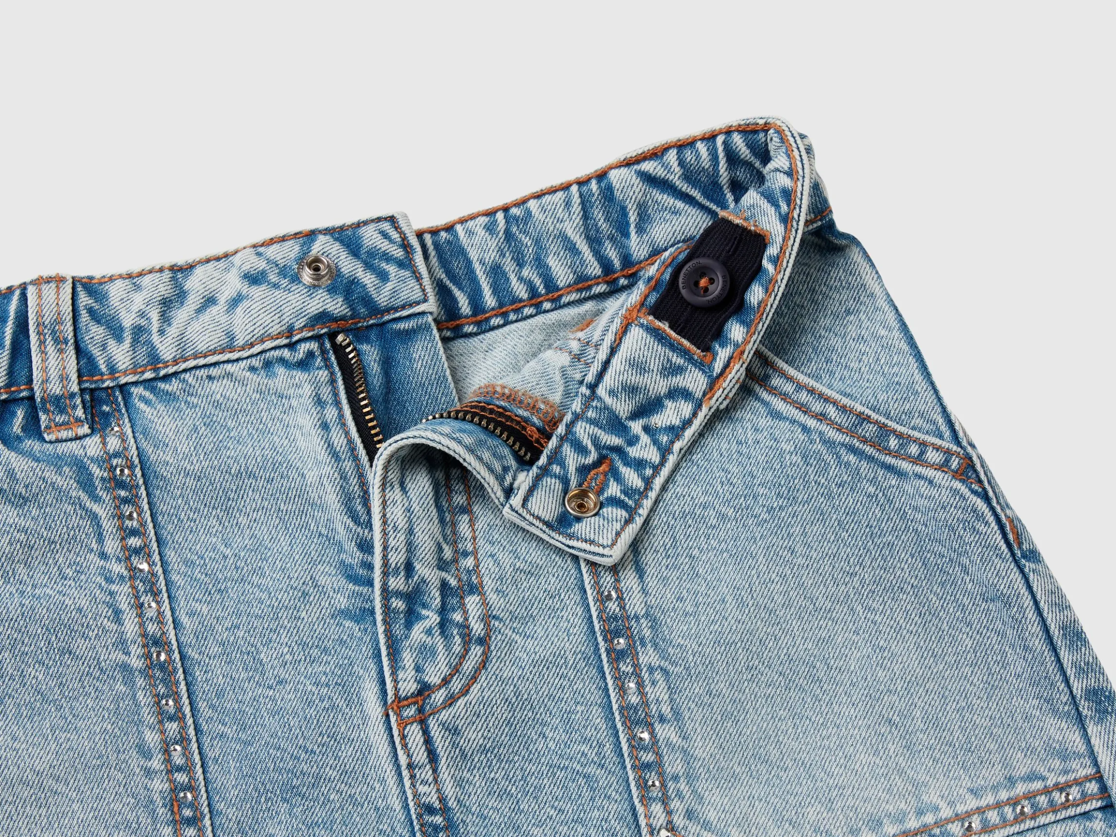 Denim mini skirt with rhinestones