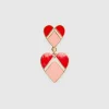 Earrings with heart pendant