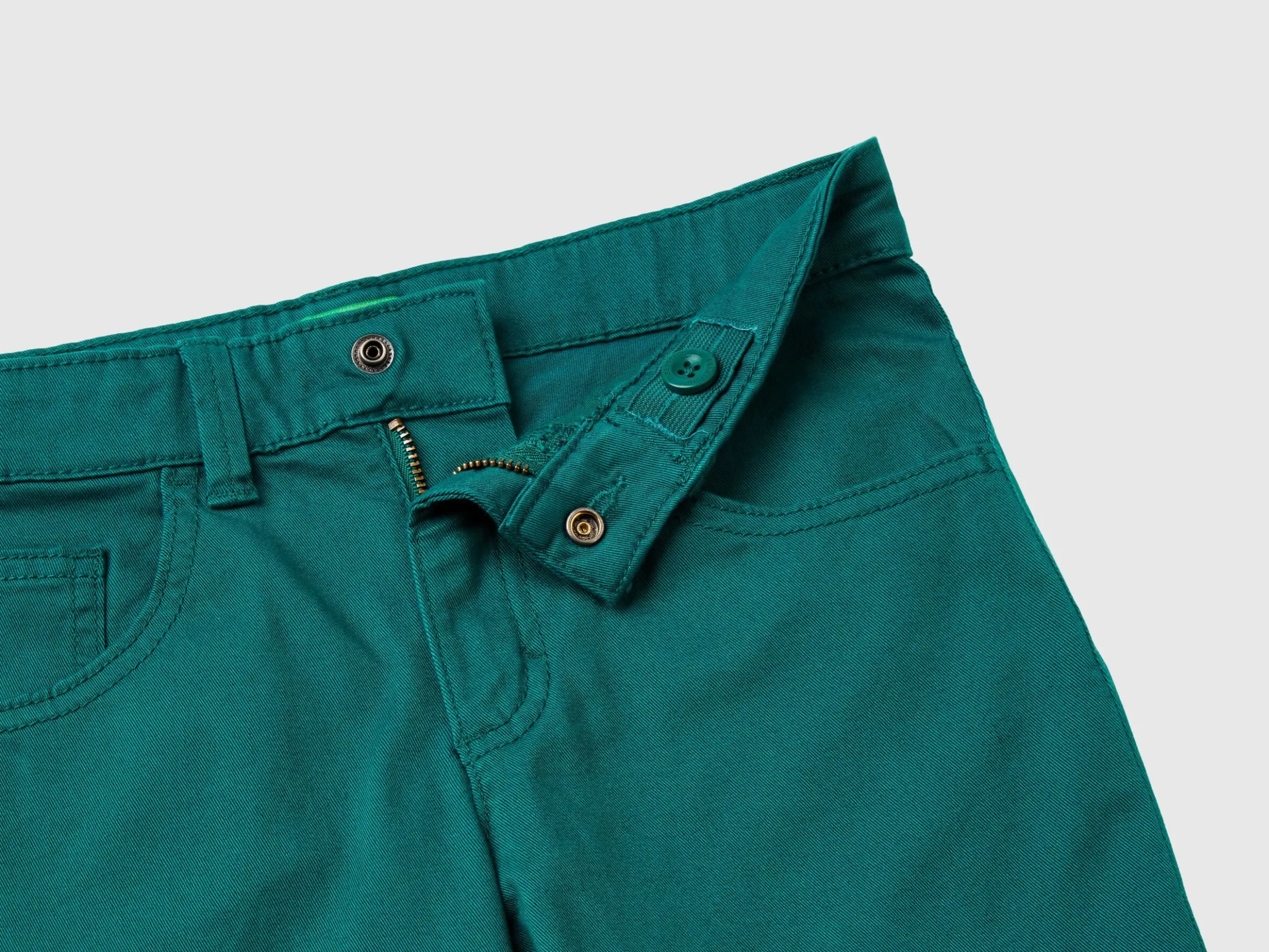 Five-pocket slim fit trousers