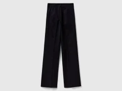 Flared trousers in stretch cotton