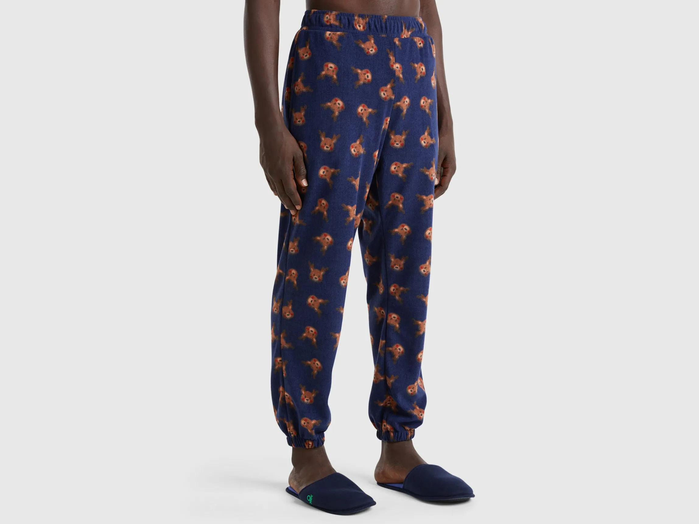 Fleece trousers with reindeer print