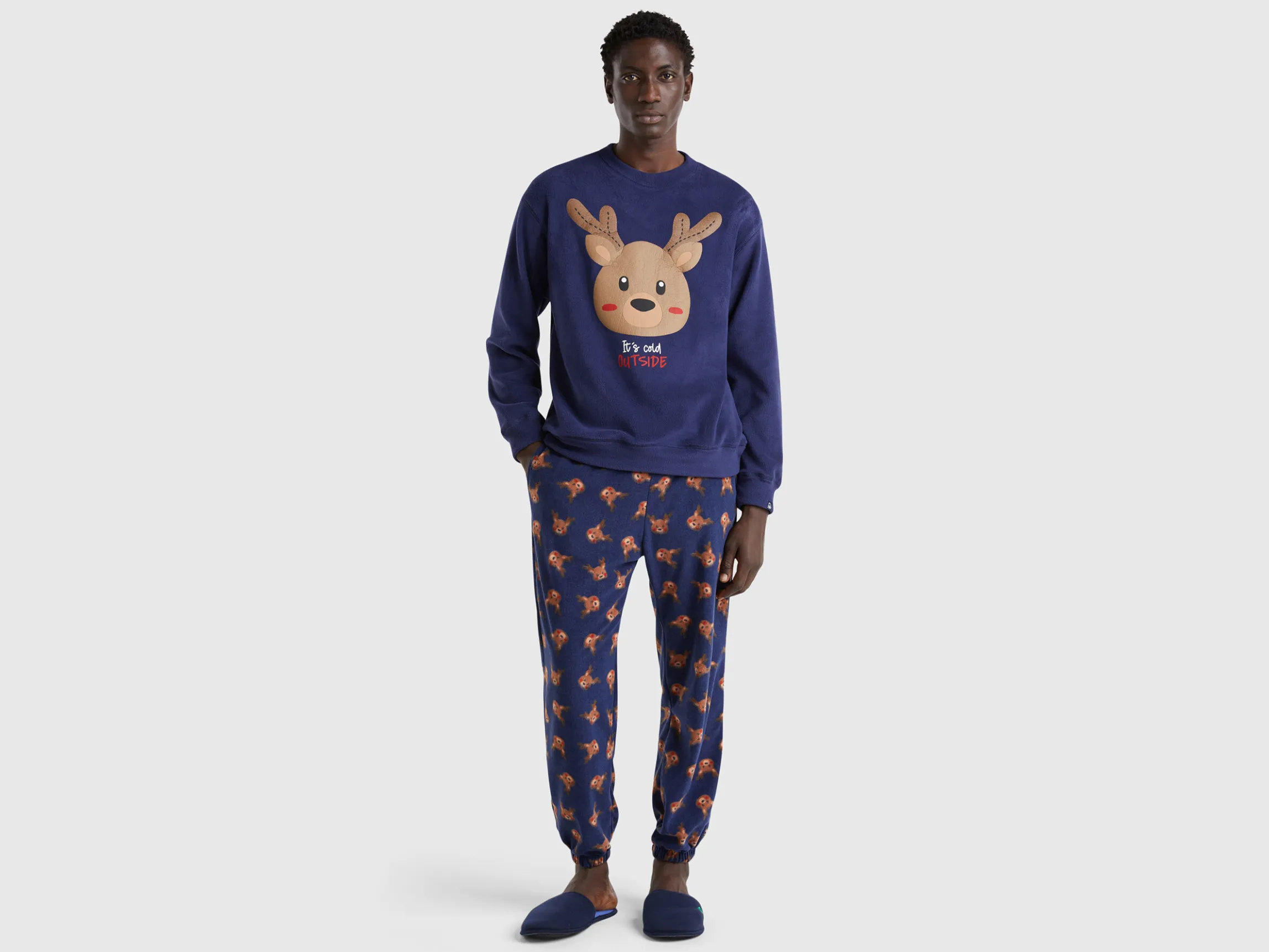 Fleece trousers with reindeer print