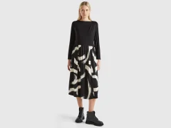 Flowy dress with patterned skirt