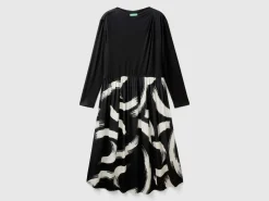 Flowy dress with patterned skirt