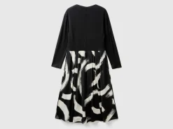 Flowy dress with patterned skirt