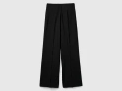 Flowy high-waisted trousers