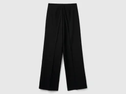 Flowy high-waisted trousers
