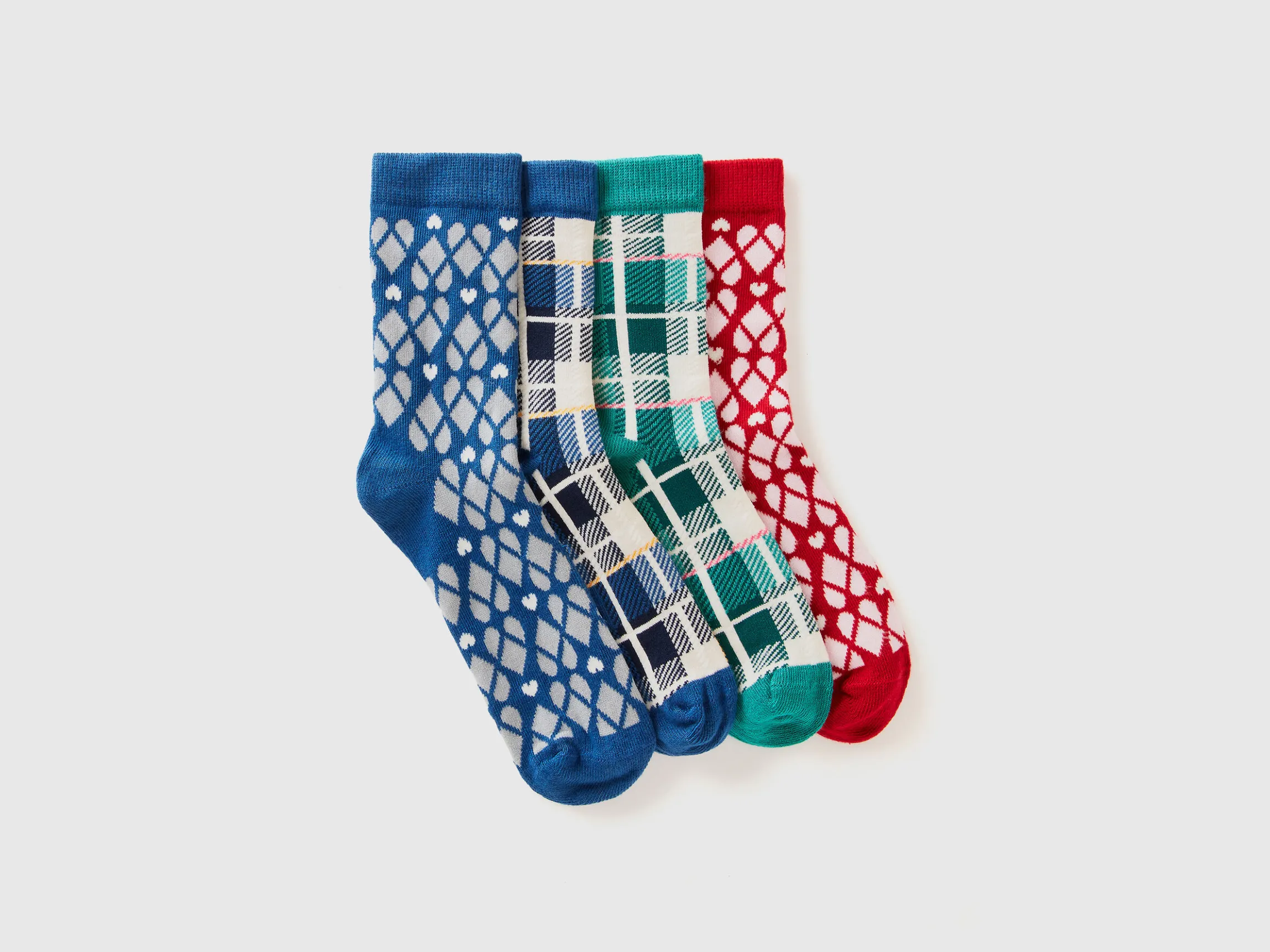 Four pairs of patterned socks
