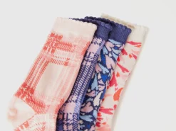 Four pairs of patterned socks