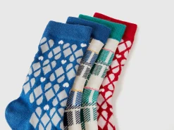 Four pairs of patterned socks